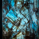 Close-up of natural Argentina Blue Onyx with blue, cream, and translucent flowing banding detail