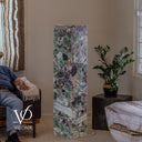 Handcrafted 55-inch Fluorite tower displayed without illumination to show the stone's natural mineral colors