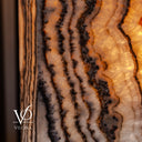 Rectangular natural stone floor lamp glowing with rich Tangerine Onyx color and handcrafted polished surfaces