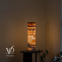 19.75-inch Sahara Onyx table lamp lit from within with warm translucent stone layers