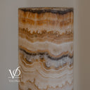 Natural Sahara Onyx table lamp showing subtle curved mineral formations and neutral stone coloring