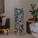 Unlit fluorite crystal floor lamp showing natural green, purple, and charcoal mineral coloring
