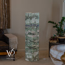 Unlit square Fluorite tower with broad green formations, fine white veining, and a muted blue-violet upper band.