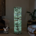 Illuminated Fluorite floor lamp with large green crystal sections above layered cream, gray, and champagne bands.