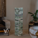 Alternate unlit view of the Fluorite floor lamp showing pale sage stone and gently undulating mineral layers.
