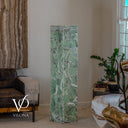Alternate unlit view of the Fluorite floor lamp showing broad green stone sections outlined by white mineral veins.