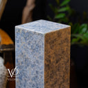 Marble column with blue and brown pattern, featuring Vilona logo.