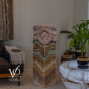 Unlit corner view of the Aqua Onyx floor lamp showing its square silhouette and pale green horizontal band.