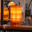 Miami Sunset onyx table lamp illuminated in a large square design