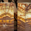 onyx-textured lamp with 'Vilona' branding on a blurred background