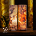 Matching 18-inch Divina Claire onyx cylinder lamps displayed together