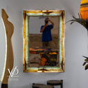 Handcrafted aqua onyx mirror featuring one-of-a-kind teal, blue, and cream stone patterns