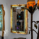 Backlit aqua onyx mirror with organic stone movement and handcrafted artisan detail