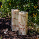 Bamboo Onyx Table Lamp Pair Light Edition #2 displayed outdoors among garden flowers