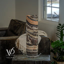 Polished Tangerine Onyx lamp switched off, revealing sweeping ivory, apricot, and charcoal mineral patterns.
