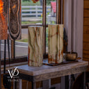 Bamboo Onyx table lamp pair Dark Edition #1 displayed on an onyx table near a rustic window