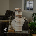 Unlit Light Tangerine Onyx cylinder table lamp with a soft cream palette and natural veining detail.