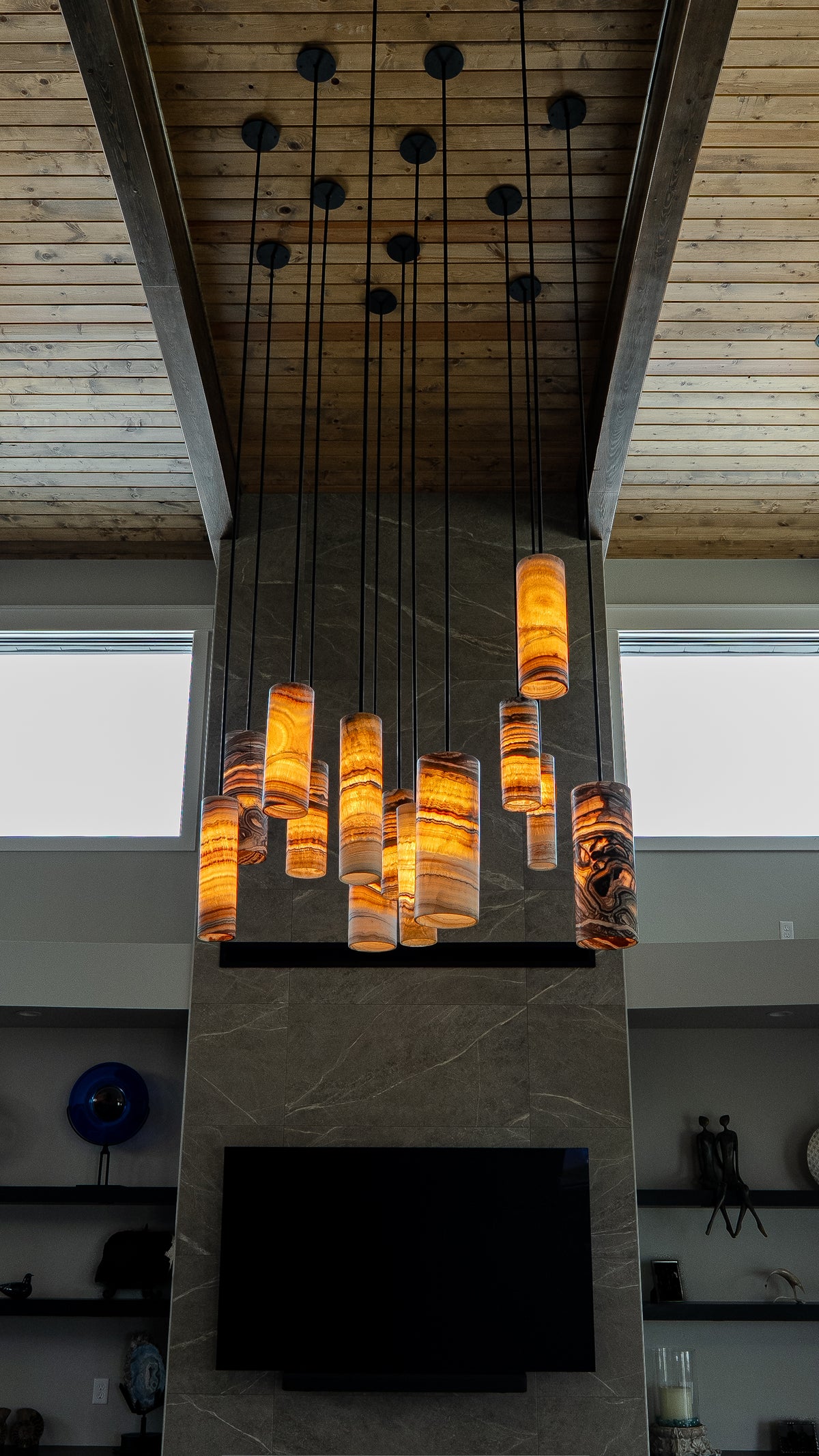 Custom chandelier composed of illuminated natural onyx pendant lights