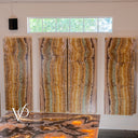 Exotic Aqua Onyx wall panel quad with amber, charcoal, cream, gold, and aqua banding