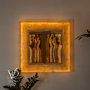 White Ice Onyx bathroom mirror glowing with cool white illumination and translucent natural stone patterns