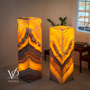 Vilona Onyx floor lamp pair illuminated from within, with each lamp measuring 12 inches square