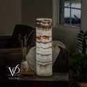 Illuminated Light Tangerine Onyx cylinder table lamp with creamy white stone and fine amber banding.