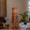 Alternate illuminated face of the Tangerine Onyx floor lamp with a cream-colored center framed by orange and dark bands.
