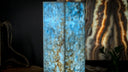 Blue marble floor lamp with gold veins, modern design.