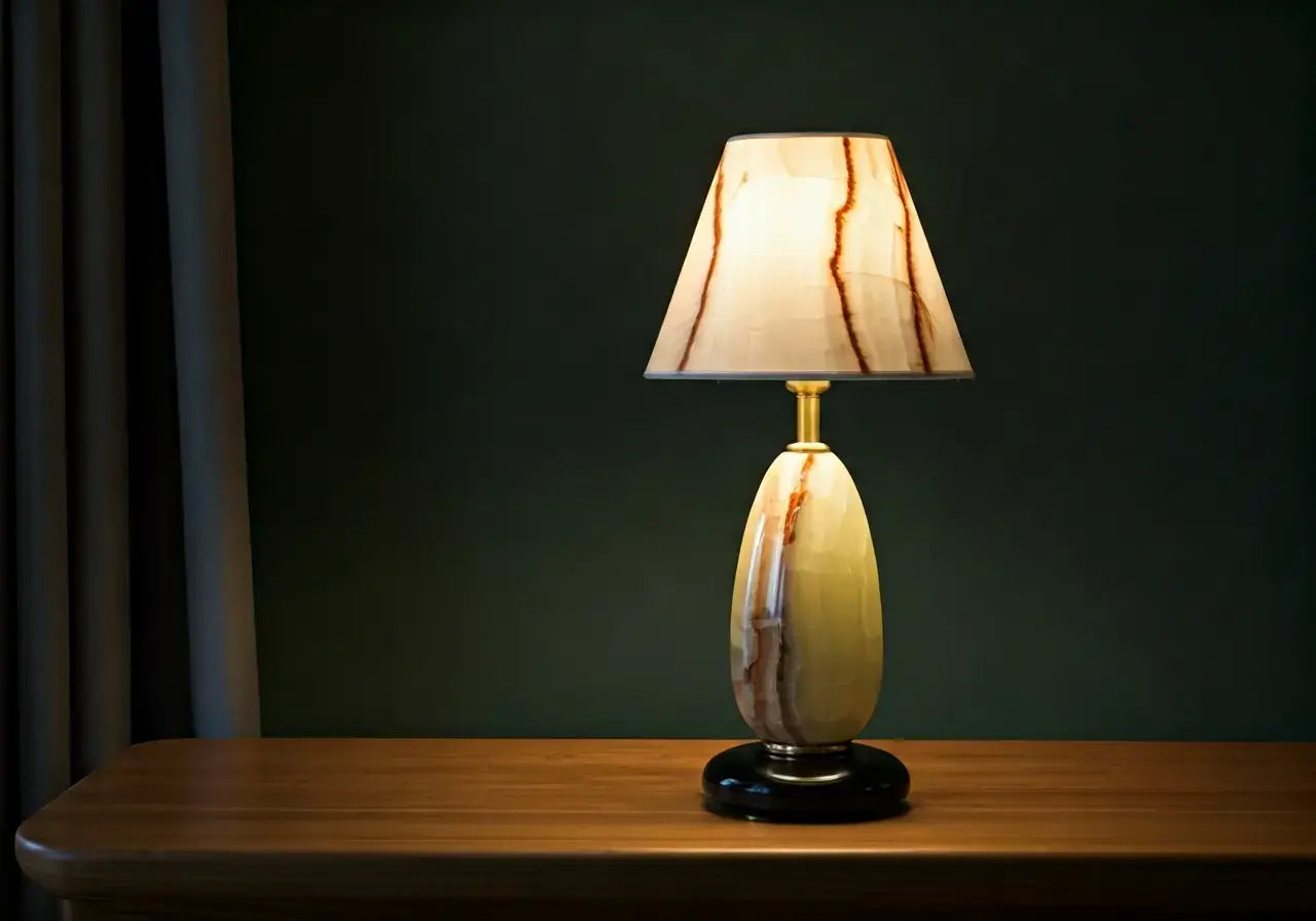 A polished onyx lamp brightens a stylish, modern living room. 35mm stock photo