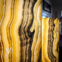 Close-up of dark mineral veining in Golden Cloud Onyx