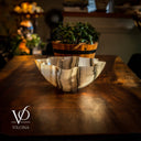 Wooden bowl on a wooden table with blurred background