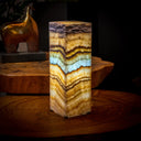 Rectangular agate table lamp with a natural stone design, featuring earthy tones of brown and beige.