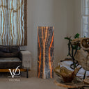 Illuminated 51-inch Tangerine Onyx floor lamp with dramatic orange and black vertical natural stone banding