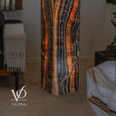 Luxury Tangerine Onyx tower glowing with symmetrical vertical banding and intense orange translucency
