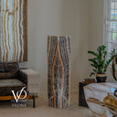 51-inch Tangerine Onyx tower displayed unlit with a striking centered flame-shaped stone pattern